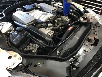 Doing a tune up on  Mercedes Benz SL63 Car