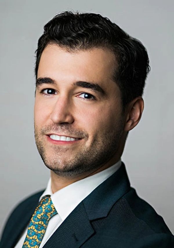 headshot of Alexander McKissick, opera singer.
