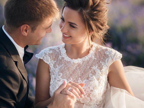 Bride and groom outside.