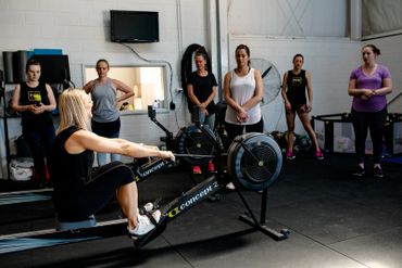 group fitness class instructions on rower