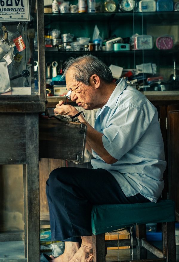 Focus of the watch maker - traditional artisan shophouses in Takapah town, Phangnga District.