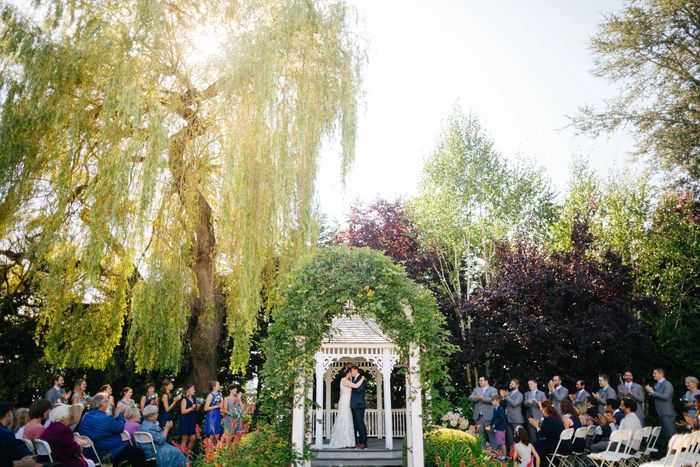 gazebo wedding with gorgeous willow tree in the background