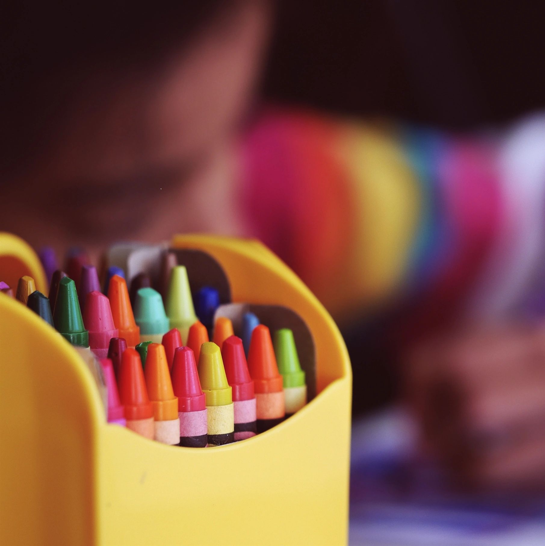 Girl coloring in kindergarten.