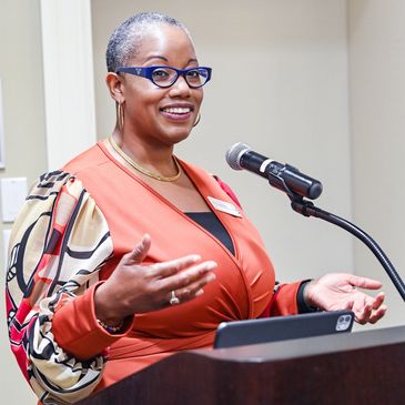 Mariama S. Boney talking at microphone