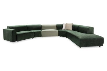 Modulaire design zetel in een groene stof waarvan 1 element in een andere stof