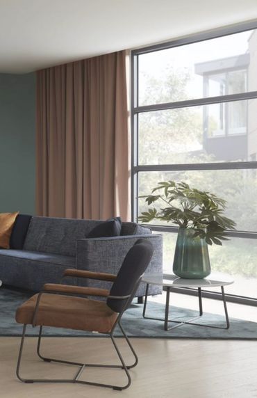 Strak vormgegeven Kiko fauteuil van Bert Plantagie in luxe bekleding