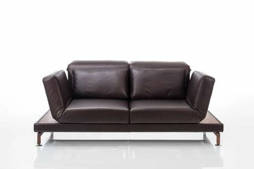 Een 2-zits Moule zetel van Brühl in leder