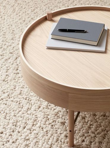 Audo Turning Table met draaibaar tafelblad en minimalistisch stalen onderstel