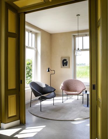 Designfauteuil Glider van Artifort, tijdloos Nederlands design met uitstekend zitcomfort