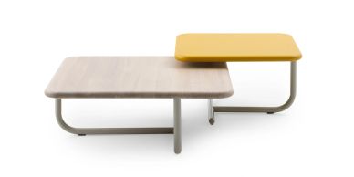 Two modern nested square coffee tables, one wooden and one yellow.