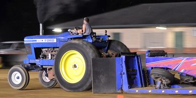 Ford tractor competing in the Farm Stock Tractor Pulls