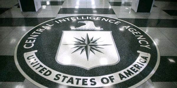 Seal of the CIA on a lobby floor.