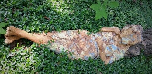 Dreaming | figurative ceramic sculpture by Hillsborough artist Tinka Jordy at Garden Art Gallery