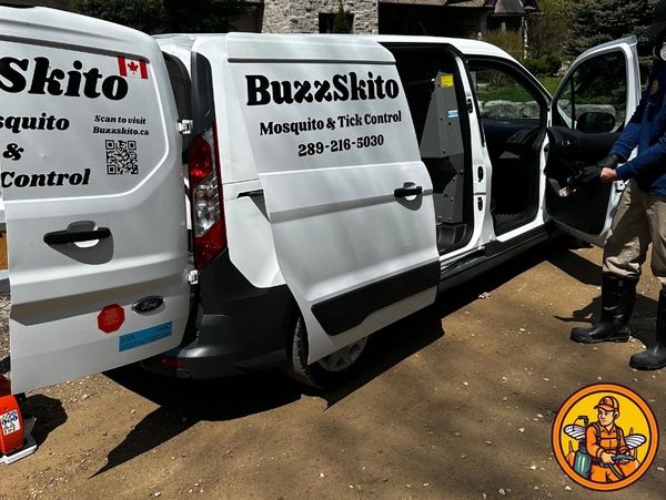 BuzzSkito technician performing mosquito and tick control in a residential backyard in Mississauga