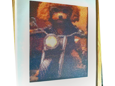 Pixelated image of a motorcyclist with a glowing headlight.