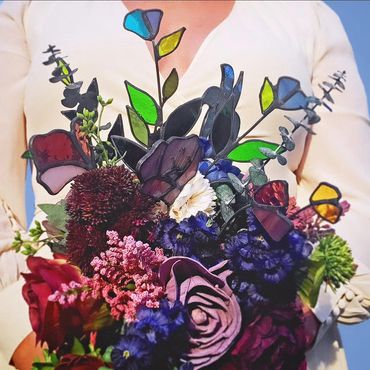 Stained Glass Forever Flowers incorporated into a wedding bouquet