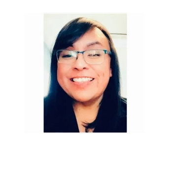 Smiling woman with glasses and long dark hair.