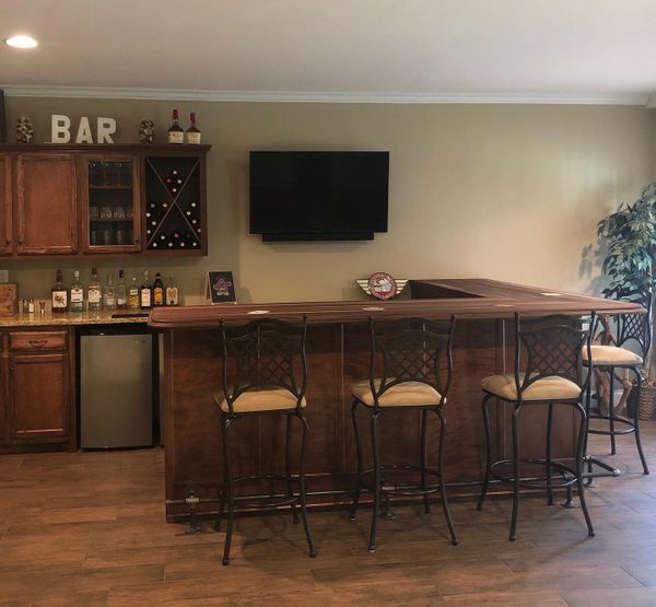 Walnut butcher block countertop on a bar top is perfect!