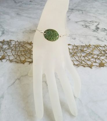 This copper bracelet is colored with alcohol ink.