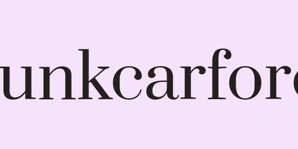 Close-up of serif font text on a light purple background.