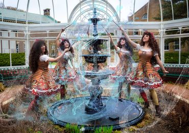 Model shot: Duplicate.
Model Raquel posing around fountain.