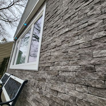 Evolve Stone nail able stone veneer installation on a residential exterior in Runnemede