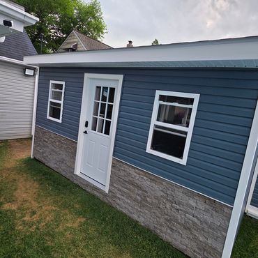 Evolve Stone veneer installed on a shed in Runnemede, New Jersey