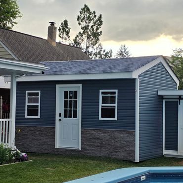 Exterior shed finished with Evolve Stone stone veneer in Runnemede NJ