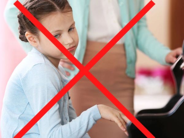 a bored piano student with a red X through the picture