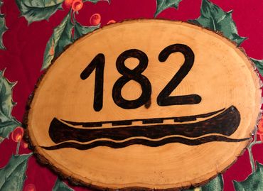 Mailbox sign with wood burned canoe design