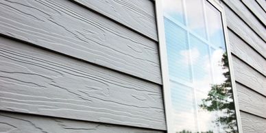 grey siding with window
