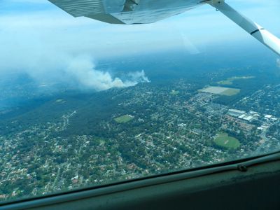 Flying over a fire area during operations