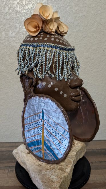 Item # 0047
Title: Beauty (Side View)
Clay, Wood, Acrylic Paint, Yarn,
African American Art