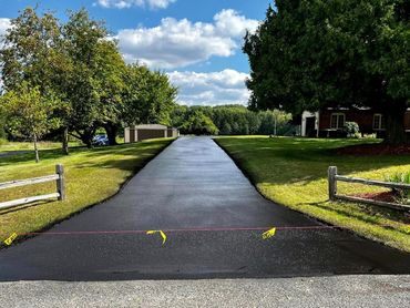 Crack Sealing and seal coating for residential driveway in Comstock Park, MI