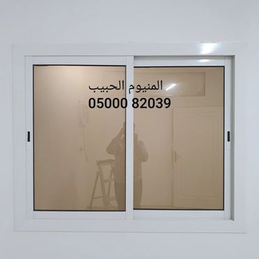 نافذة منزلقة مع زجاج رملي