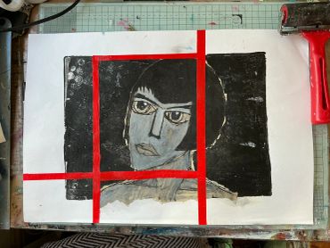 Abstract portrait with red grid and black background.