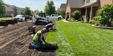 Workers laying new sod on a residential lawn on a sunny day.
