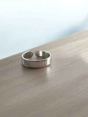 our faith ring in saintly silver