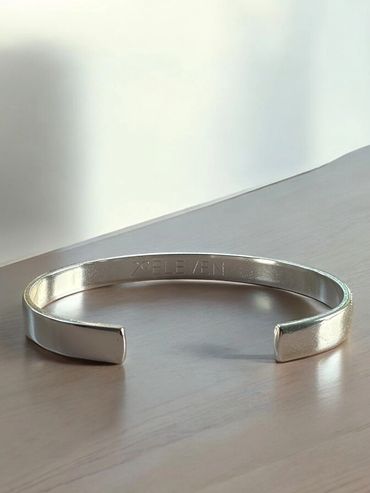 the back of one of our beautiful cuffs in saintly silver