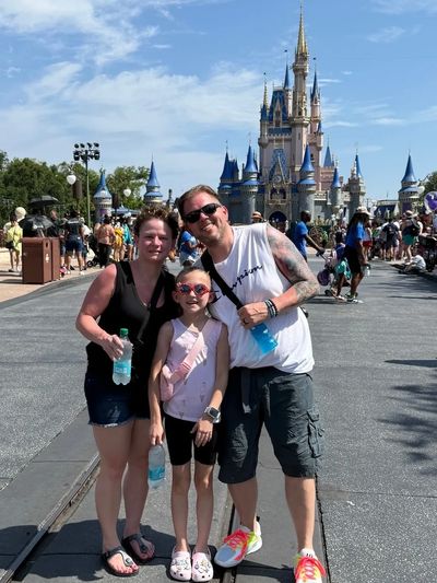 My amazing family in front of the iconic castle at Magic Kingdom! What a magical moment!