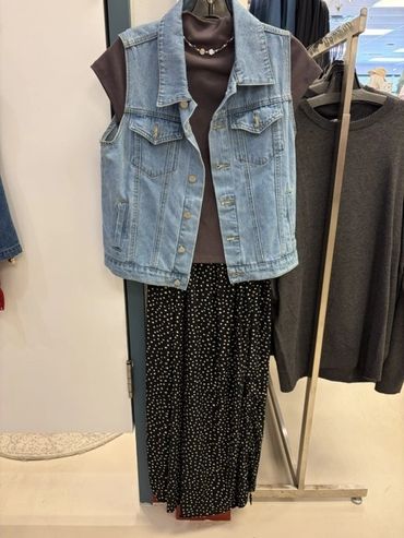 Denim vest outfit with a brown top and black polka dot pants at The Peak in Albertville, MN