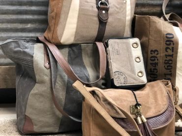 Collection of various canvas bags and purses at The Peak in Albertville, MN