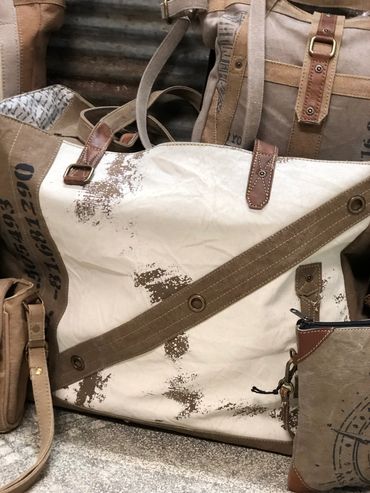 Canvas and leather bags with a vintage look at The Peak in Albertville, MN