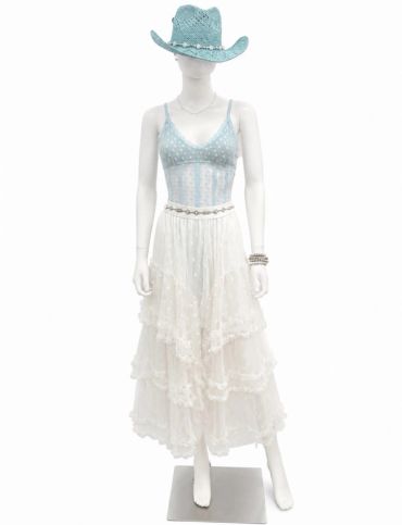Mannequin dressed in a blue top, white skirt, and blue hat at The Peak in Albertville, MN