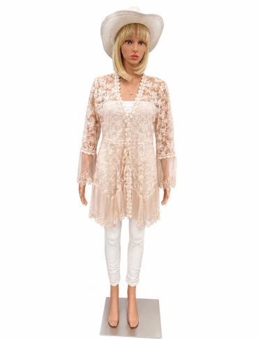 Mannequin wearing a white lace cardigan and a white hat at The Peak in Albertville, MN
