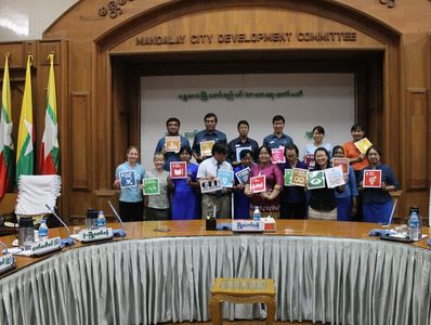 Public health students in Myanmar presenting research on sustainable development goals SDGs