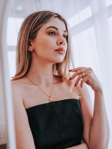 Ukrainian/Canadian Model An Maur poses in front of mirror wearing Dazzle by Pari Jewlery