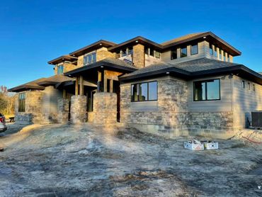 3 coat stucco, cement board stucco, EIFS and manufactured stone.