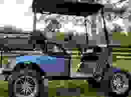 A custom EZ Go TXT golf cart from Creative Custom Carts 