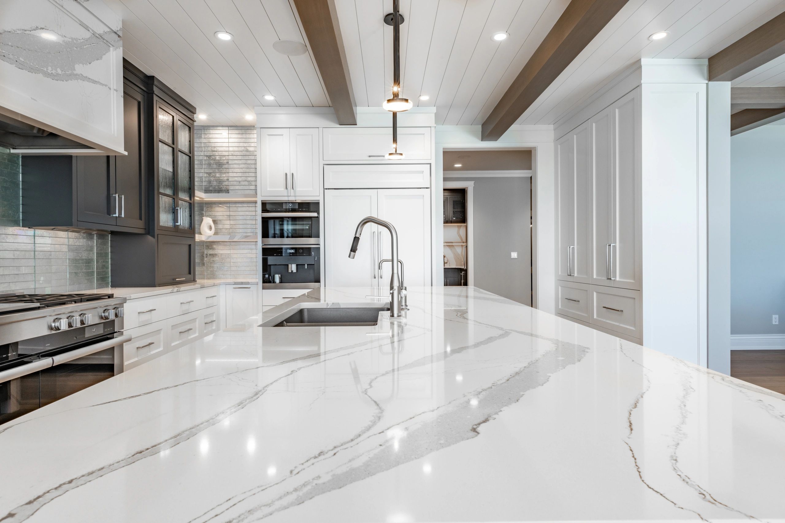 Kitchen Remodel Peoria Arizona Understated but Elegant white shaker cabinets. Quartz counters with a